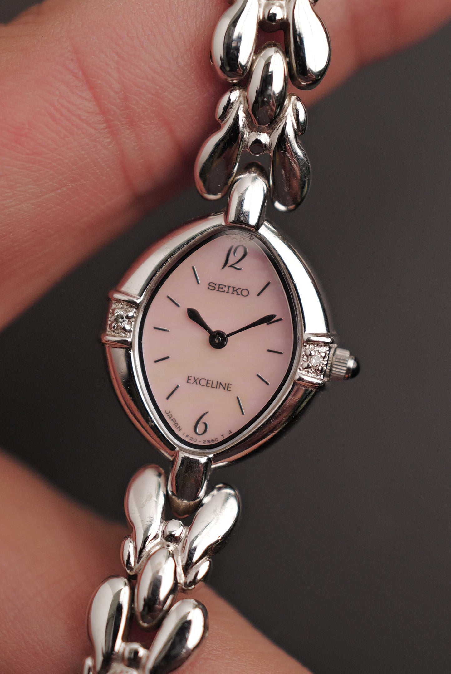 Seiko Exceline Mother of Pearl dial Tear-drop Bracelet in pink Circa. 1989