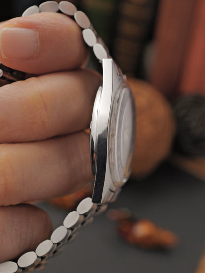 Omega Genève “Silver Tonneau" with Bracelet Ref. 135.041 (circa 1970)