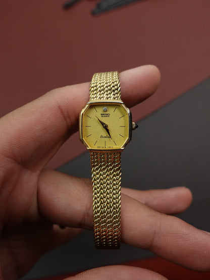 Seiko Exceline Gold integrated bracelet (yellow dial) 1221-5080