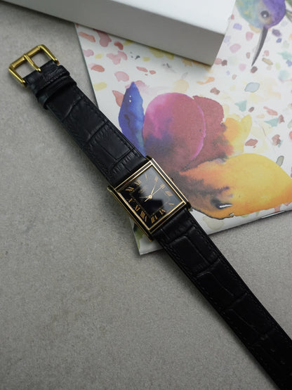 Orient Tank Art Deco case with ruby lacquer inserts on case