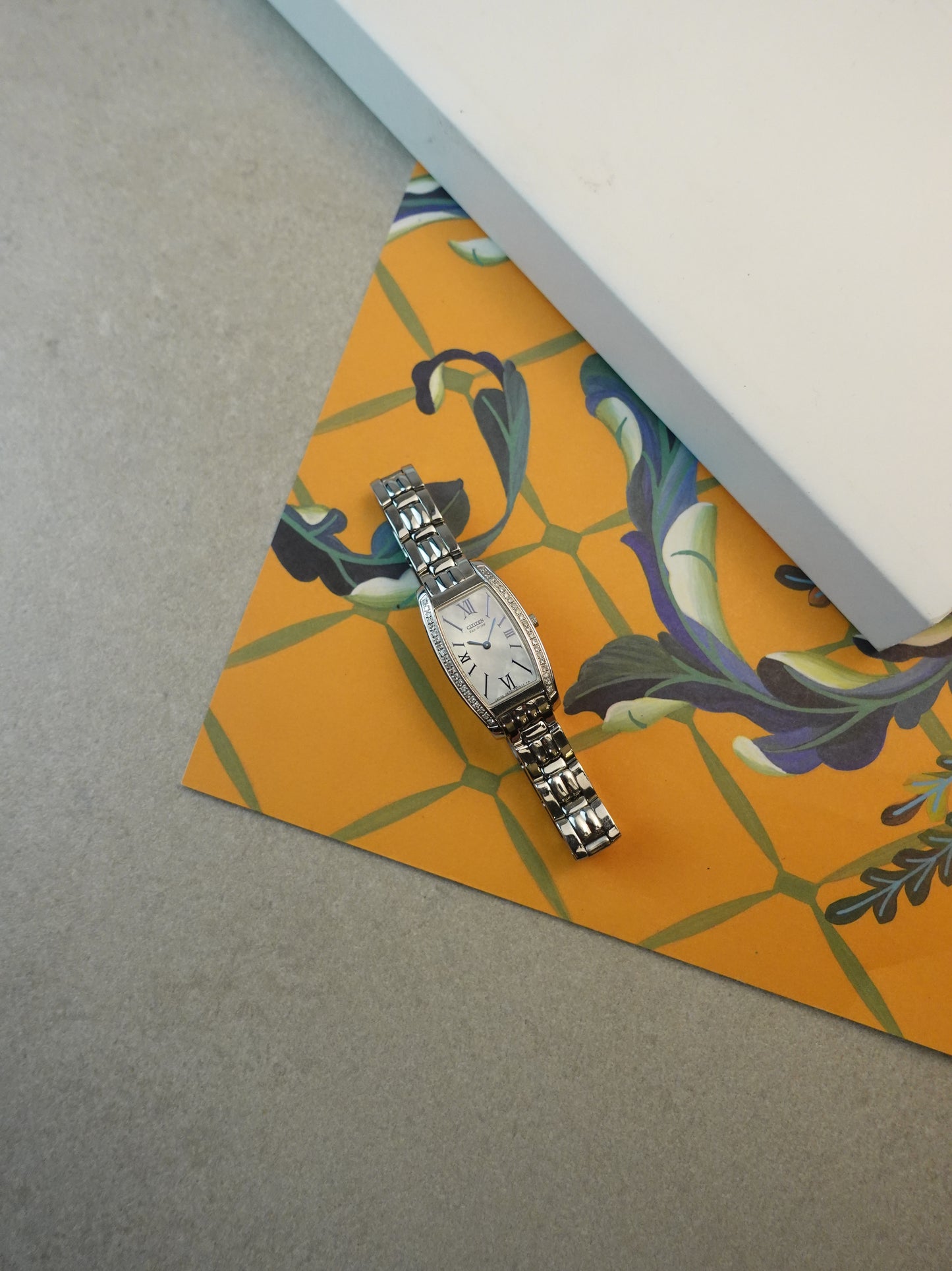 Citizen Eco-drive Tonneau with side diamonds and mother of pearl dial