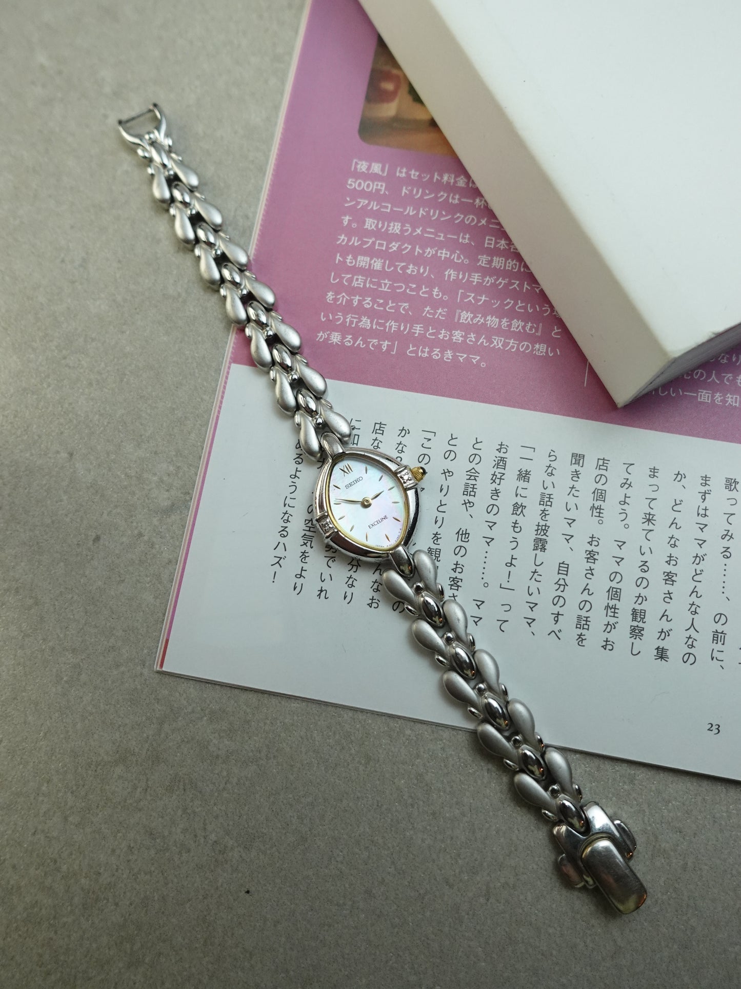 Seiko Exceline bracelet with rainbow mother of pearl