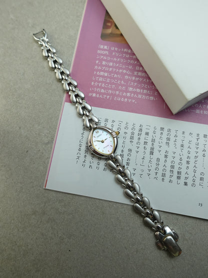 Seiko Exceline bracelet with rainbow mother of pearl