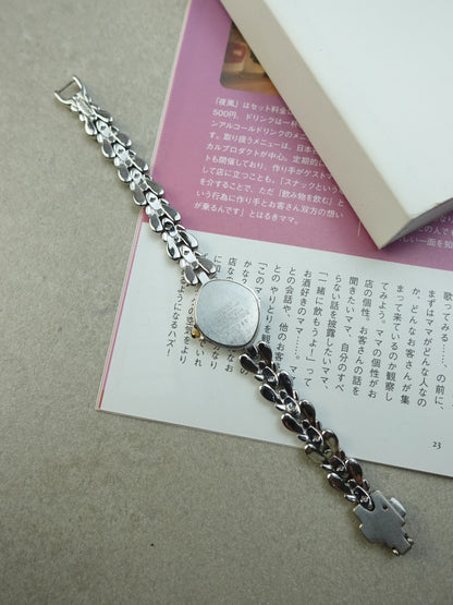 Seiko Exceline bracelet with rainbow mother of pearl