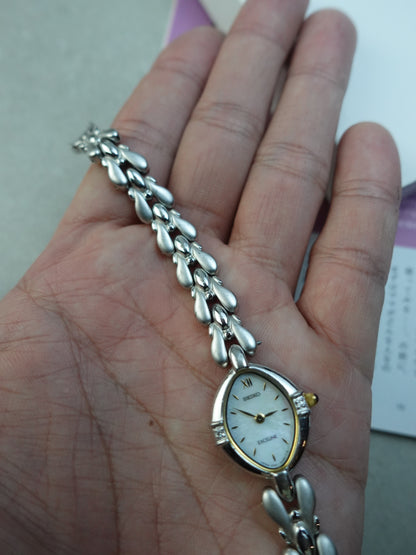 Seiko Exceline bracelet with rainbow mother of pearl