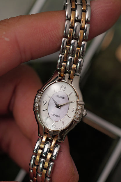 Seiko Exceline Oval with mother of pearl dial and bezel diamonds Circa. 1994 Full set