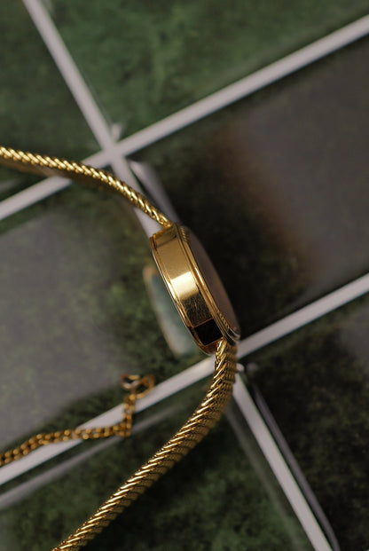 Seiko Quartz "Golden Cushion" integrated bracelet circa. 1979