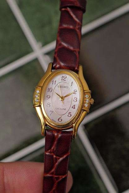 Seiko Exceline Art Deco Diamond Case with Pink Mother of Pearl Dial