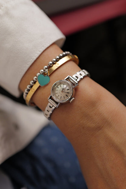 1970s Cocktail Omega De ville with faceted Glass dome Cal.485