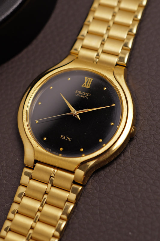 Seiko SX Gold integrated bracelet v701-6k00 Circa.1992