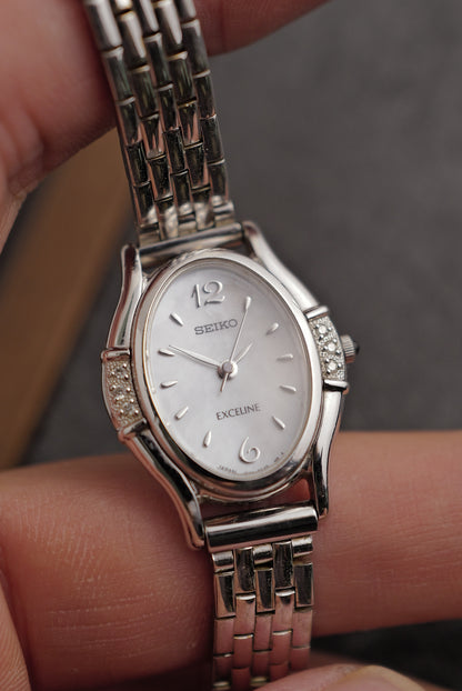 Seiko Exceline Mother of Pearl Diamond Bezel on custom bracelet Circa. 1992