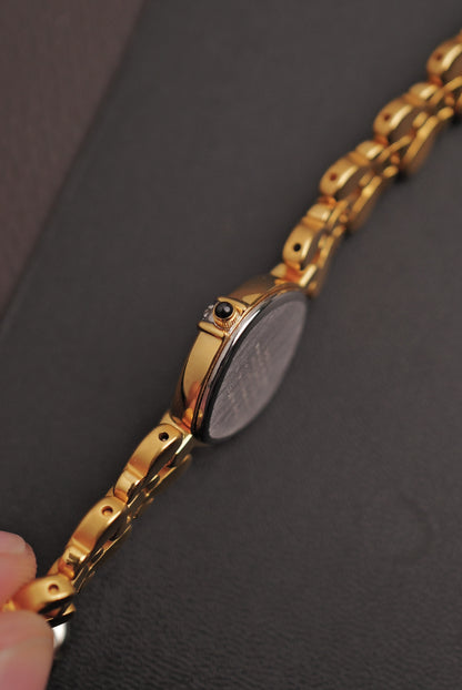 Seiko Exceline Mother of Pearl dial Tear-drop Bracelet in Gold Circa. 1989