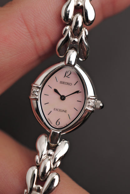 Seiko Exceline Mother of Pearl dial Tear-drop Bracelet in pink Circa. 1989