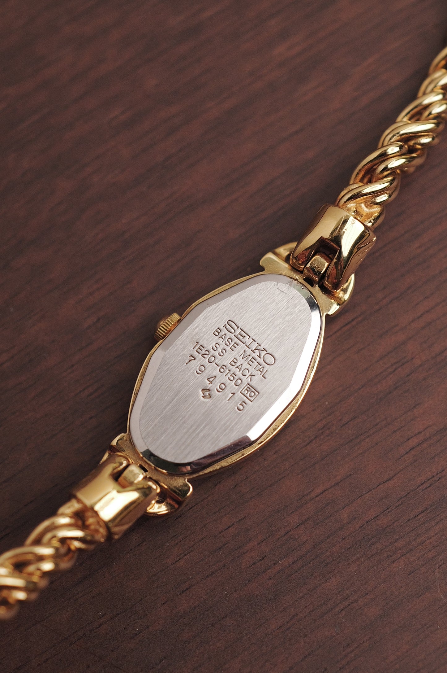 Seiko "Rosevine" w/ blue-clear gem setting circa. 1986