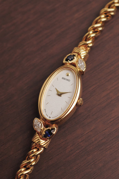Seiko "Rosevine" w/ blue-clear gem setting circa. 1986