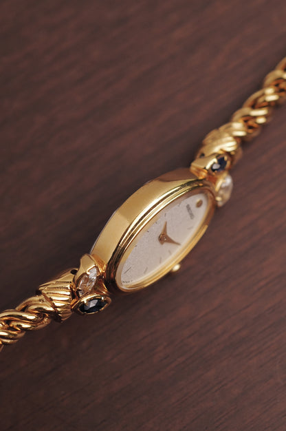 Seiko "Rosevine" w/ blue-clear gem setting circa. 1986