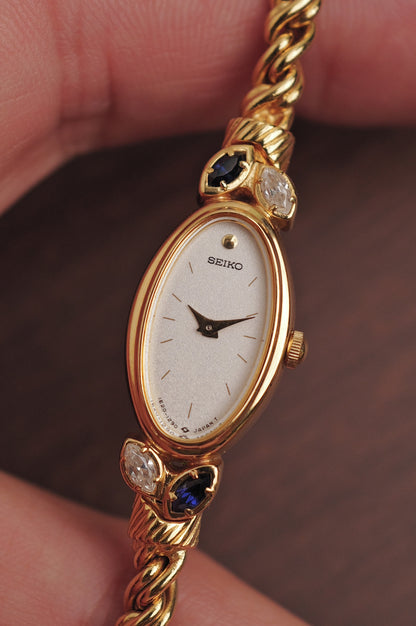 Seiko "Rosevine" w/ blue-clear gem setting circa. 1986