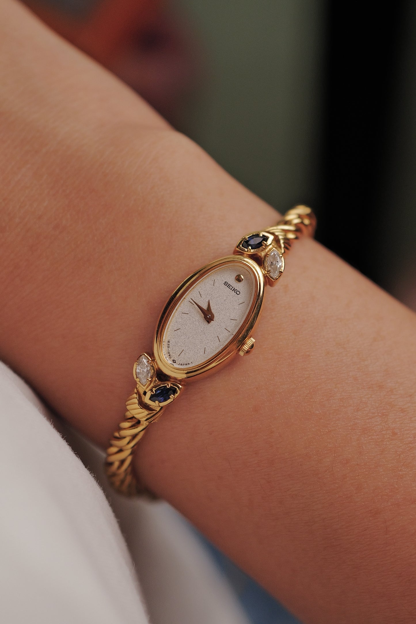 Seiko "Rosevine" w/ blue-clear gem setting circa. 1986