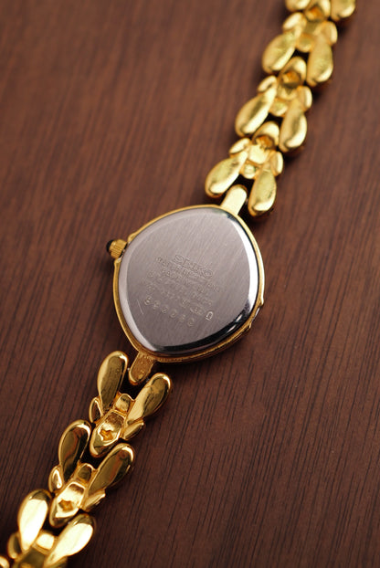 Seiko Exceline Mother of Pearl dial Tear-drop Bracelet in Gold Circa. 1989