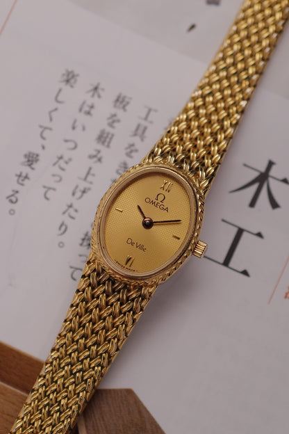 Omega de-ville "mini oval" Linen dial Integrated bracelet Circa. 1980s