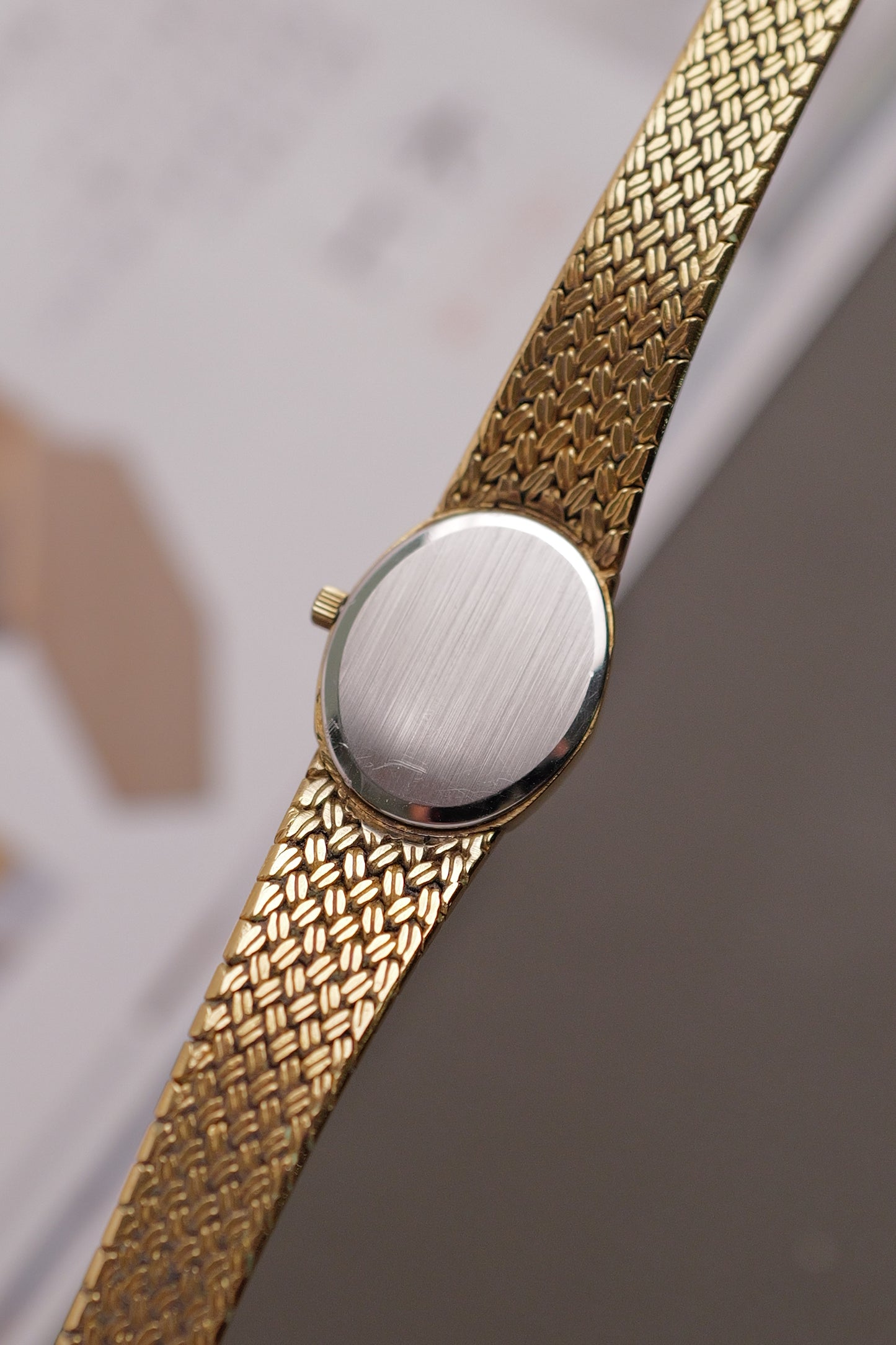 Omega de-ville "mini oval" Linen dial Integrated bracelet Circa. 1980s