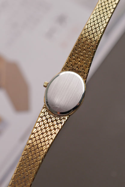 Omega de-ville "mini oval" Linen dial Integrated bracelet Circa. 1980s