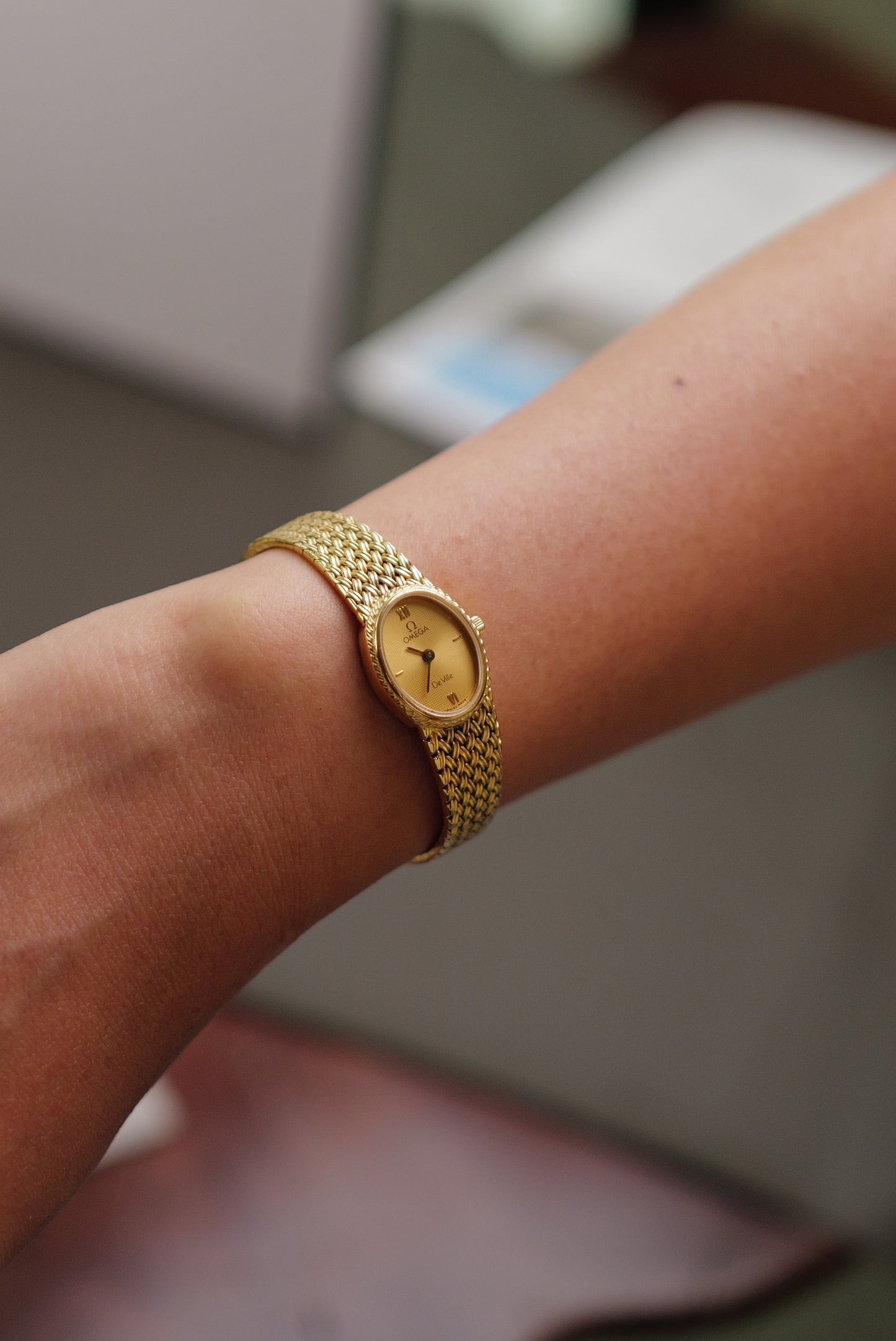 Omega de-ville "mini oval" Linen dial Integrated bracelet Circa. 1980s
