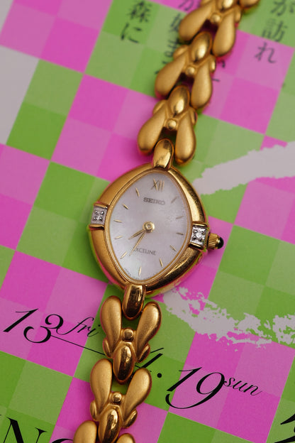 Seiko Exceline Mother of Pearl dial Tear-drop Bracelet in Gold Circa. 1989