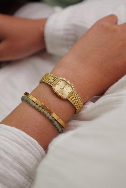 Omega De-ville integrated Bracelet "sunburst" Circa. 1980s
