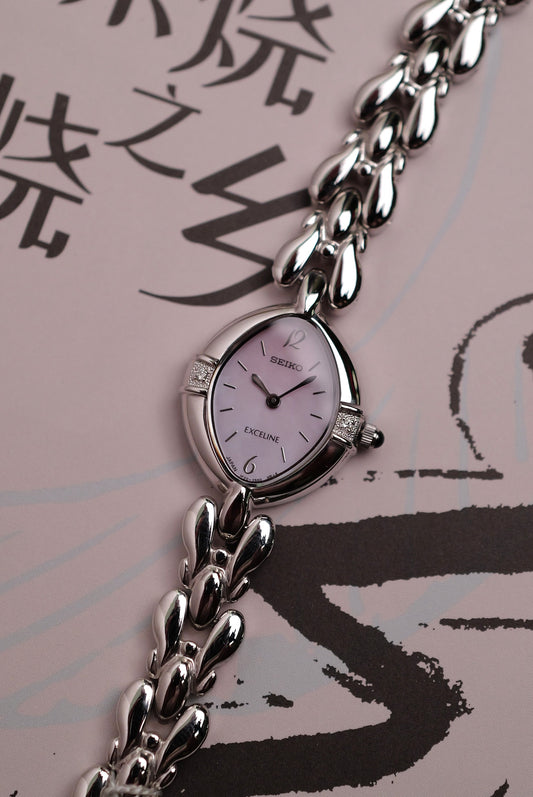 Seiko Exceline Mother of Pearl dial Tear-drop Bracelet in pink Circa. 1994