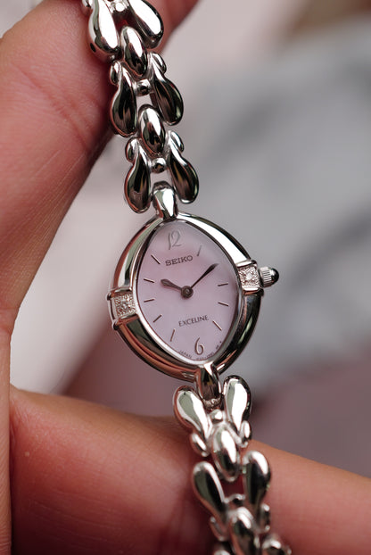 Seiko Exceline Mother of Pearl dial Tear-drop Bracelet in pink Circa. 1994 new old stock