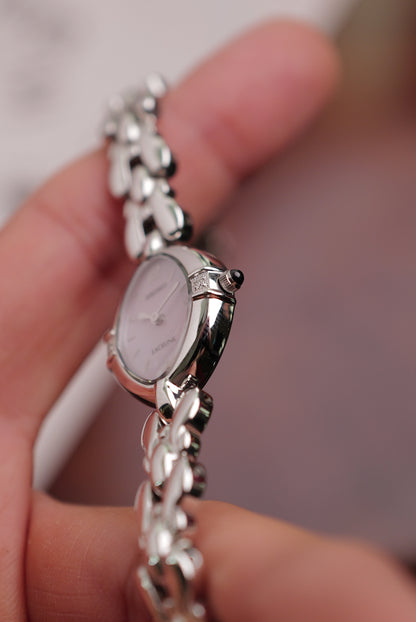 Seiko Exceline Mother of Pearl dial Tear-drop Bracelet in pink Circa. 1994 new old stock