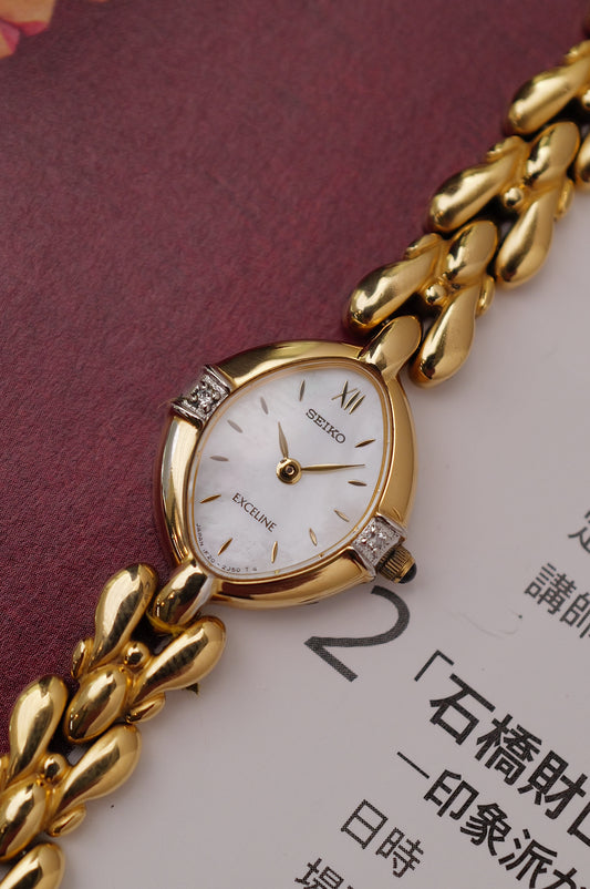 Seiko Exceline Mother of Pearl dial Tear-drop Bracelet in Gold Circa. 1989