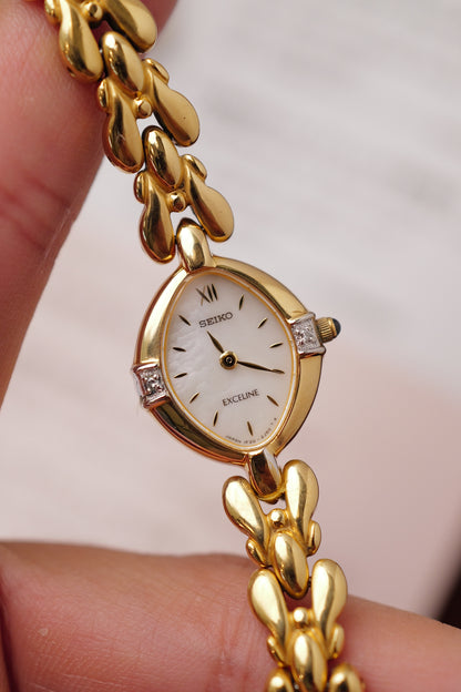 Seiko Exceline Mother of Pearl dial Tear-drop Bracelet in Gold Circa. 1989
