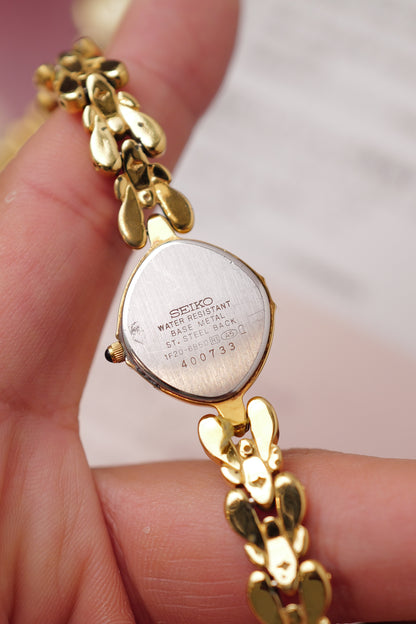 Seiko Exceline Mother of Pearl dial Tear-drop Bracelet in Gold Circa. 1989