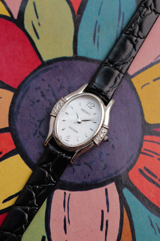 Seiko Exceline Mother of Pearl Diamond Bezel on custom bracelet Circa. 1992
