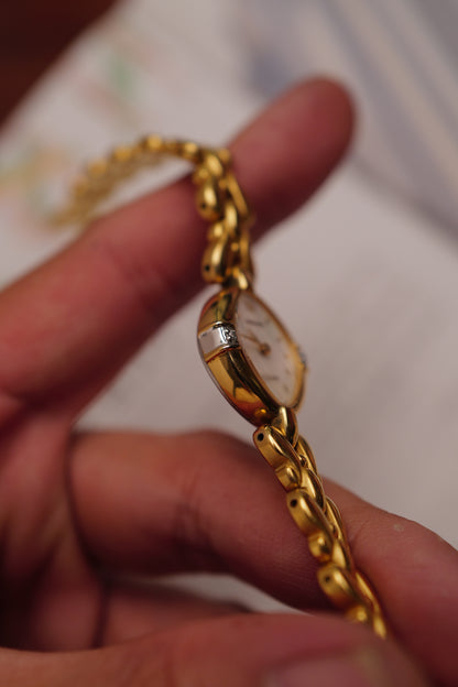 Seiko Exceline Mother of Pearl dial Tear-drop Bracelet in Gold Circa. 1989