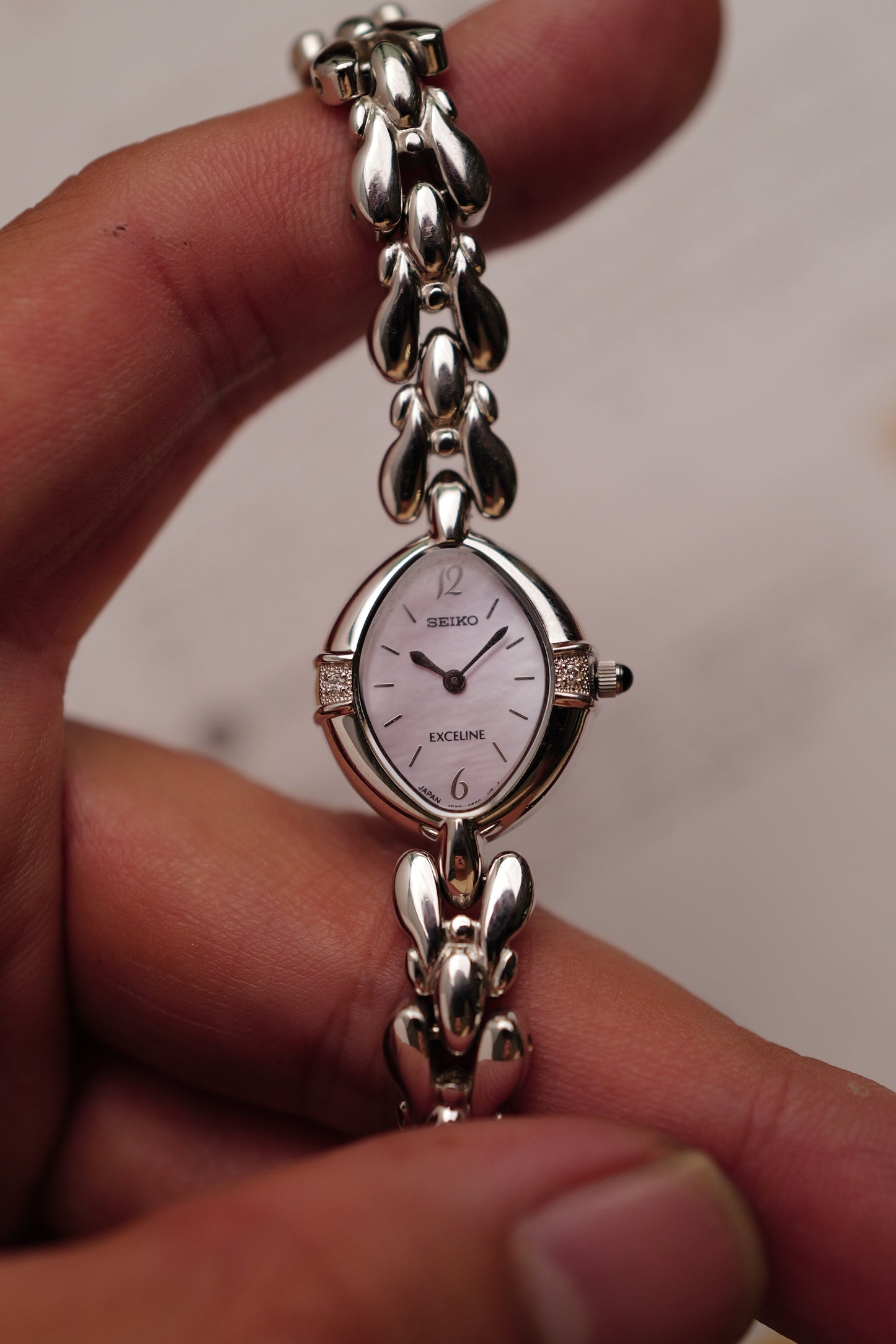 Seiko Exceline Mother of Pearl dial Tear-drop Bracelet in pink Circa. 1989