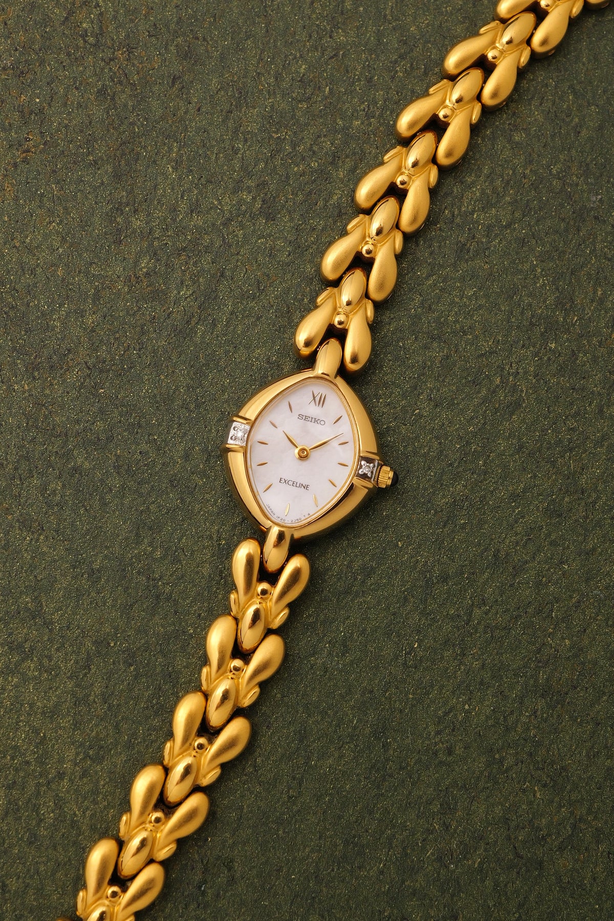 Seiko Exceline Mother of Pearl dial Tear-drop Bracelet in Gold Circa. 1989