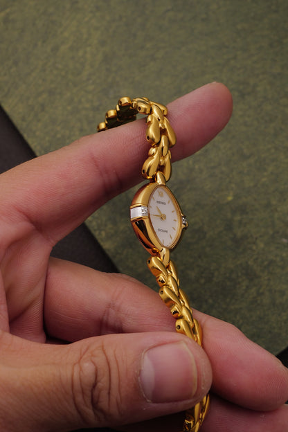 Seiko Exceline Mother of Pearl dial Tear-drop Bracelet in Gold Circa. 1989