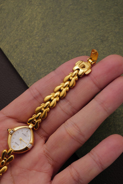 Seiko Exceline Mother of Pearl dial Tear-drop Bracelet in Gold Circa. 1989