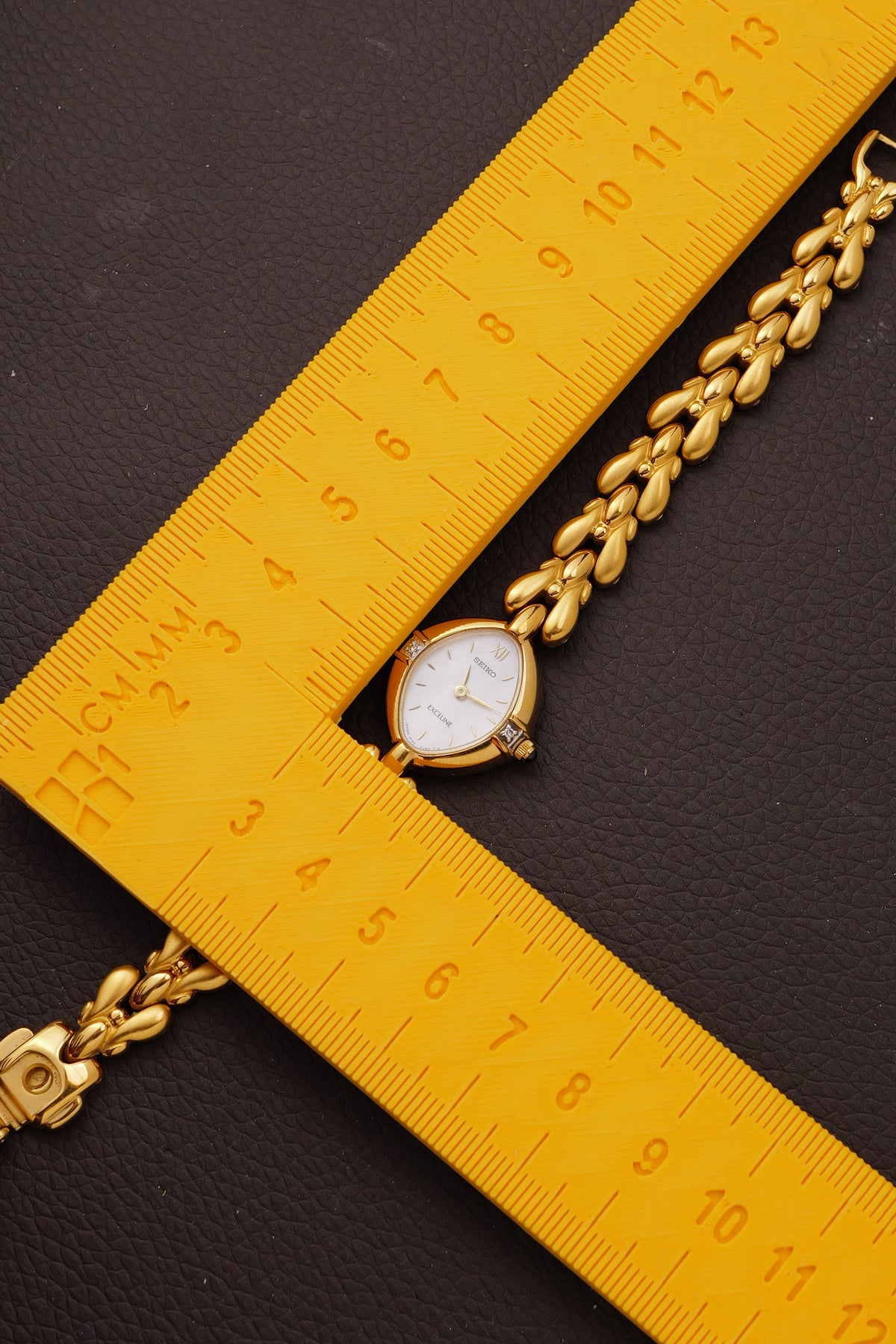 Seiko Exceline Mother of Pearl dial Tear-drop Bracelet in Gold Circa. 1989