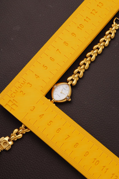 Seiko Exceline Mother of Pearl dial Tear-drop Bracelet in Gold Circa. 1989
