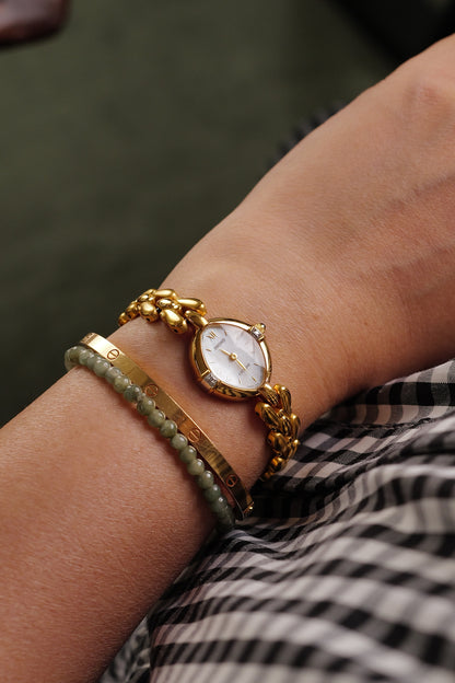 Seiko Exceline Mother of Pearl dial Tear-drop Bracelet in Gold Circa. 1989